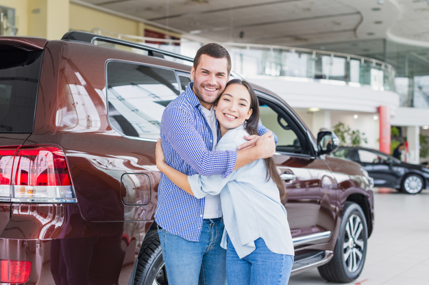 couple-car-dealership_23-2148130224